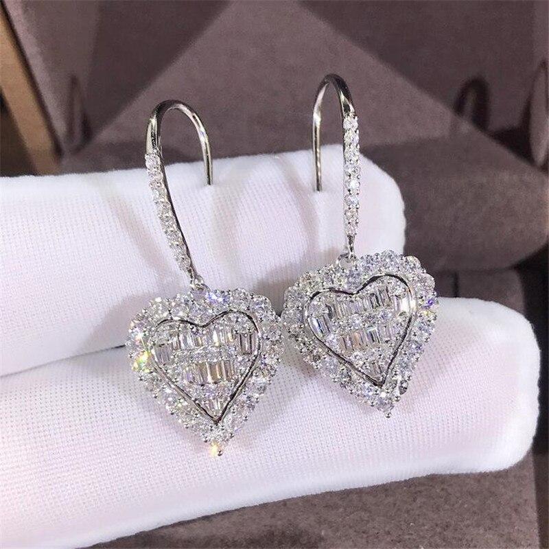 Ins Bling сверкающие роскошные ювелирные изделия из стерлингового серебра 925 пробы полностью белые прозрачные 5A кубический циркон в форме сердца крючок женские висячие серьги
Ins Bling сверкающие роскошные ювелирные изделия из стерлингового серебра 925 пробы полностью белые прозрачные 5A кубический циркон в форме сердца крючок женские висячие серьги