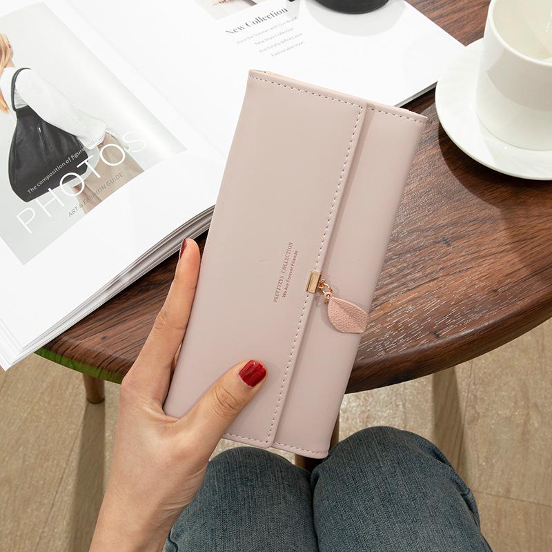 Korean Style Women s Three-Fold Wallet with Leaf Pendant - Large Capacity Multifunctional Clutch for Students
Korean Style Women s Three-Fold Wallet with Leaf Pendant - Large Capacity Multifunctional Clutch for Students