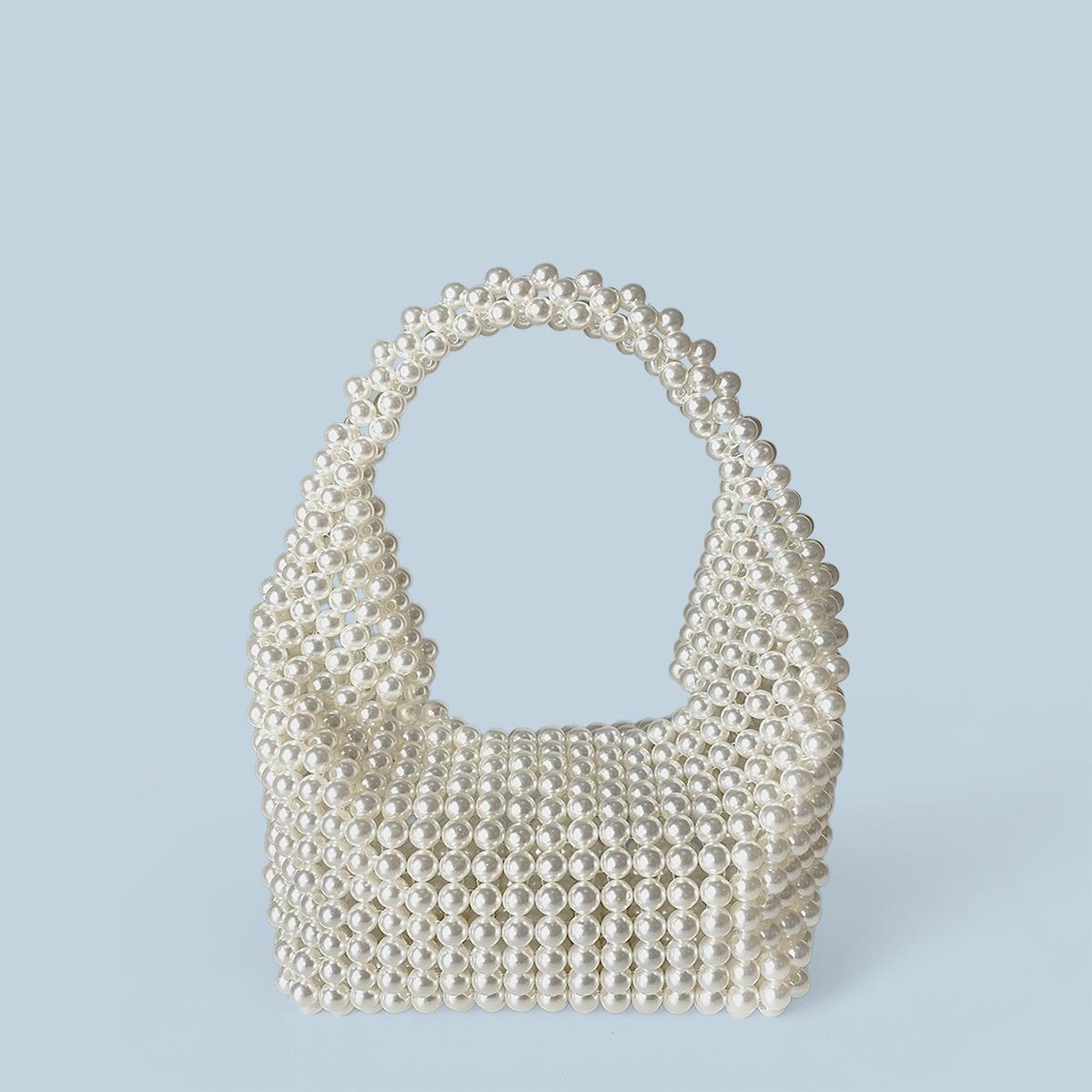 Клатч из бисера и жемчуга ручной работы (Бесцепной) белый
Клатч из бисера и жемчуга ручной работы (Бесцепной) белый