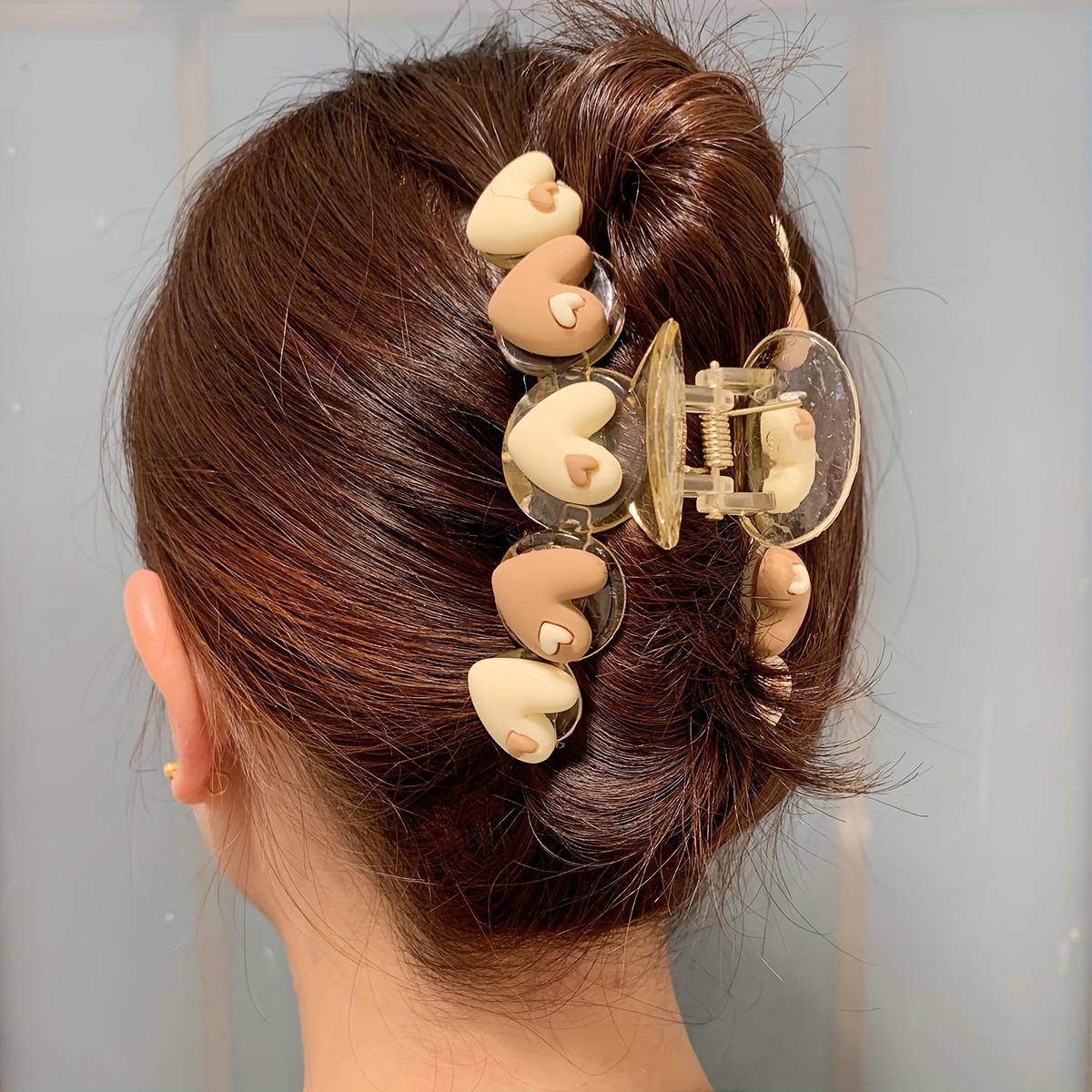 A Stylish And Elegant Basic Hair Claw for Women, Featuring a Heart Design in Two Colors, Perfect for Everyday Wear.
A Stylish And Elegant Basic Hair Claw for Women, Featuring a Heart Design in Two Colors, Perfect for Everyday Wear.