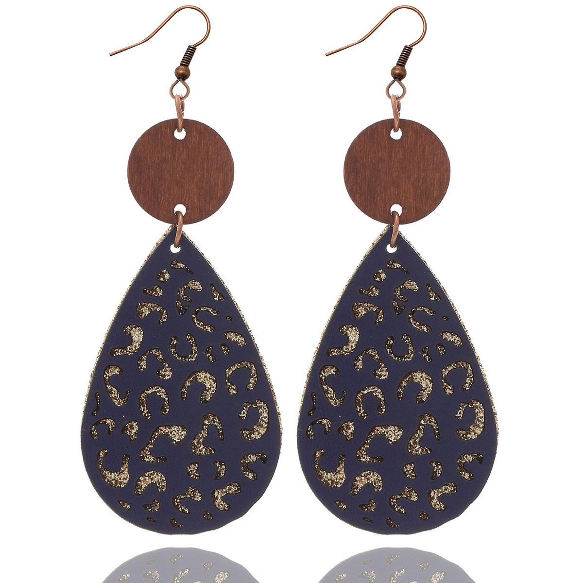 Винтажные деревянные серьги-капли с леопардовым принтом
Винтажные деревянные серьги-капли с леопардовым принтом