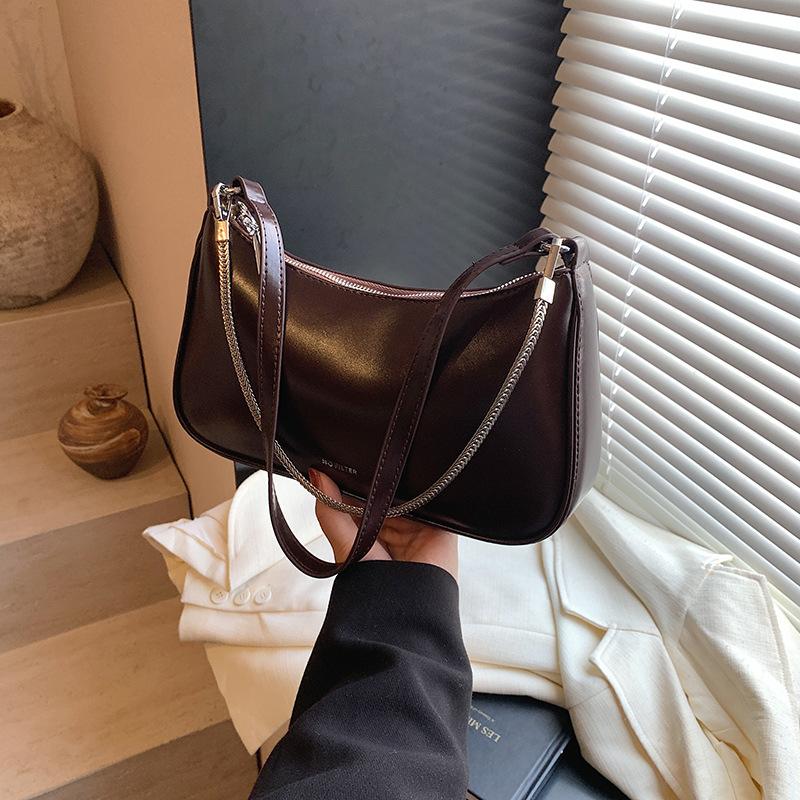 Niche high-end underarm bag chain baguette bag women s bag 2025 new simple retro shoulder messenger bag кавовий
Niche high-end underarm bag chain baguette bag women s bag 2025 new simple retro shoulder messenger bag кавовий