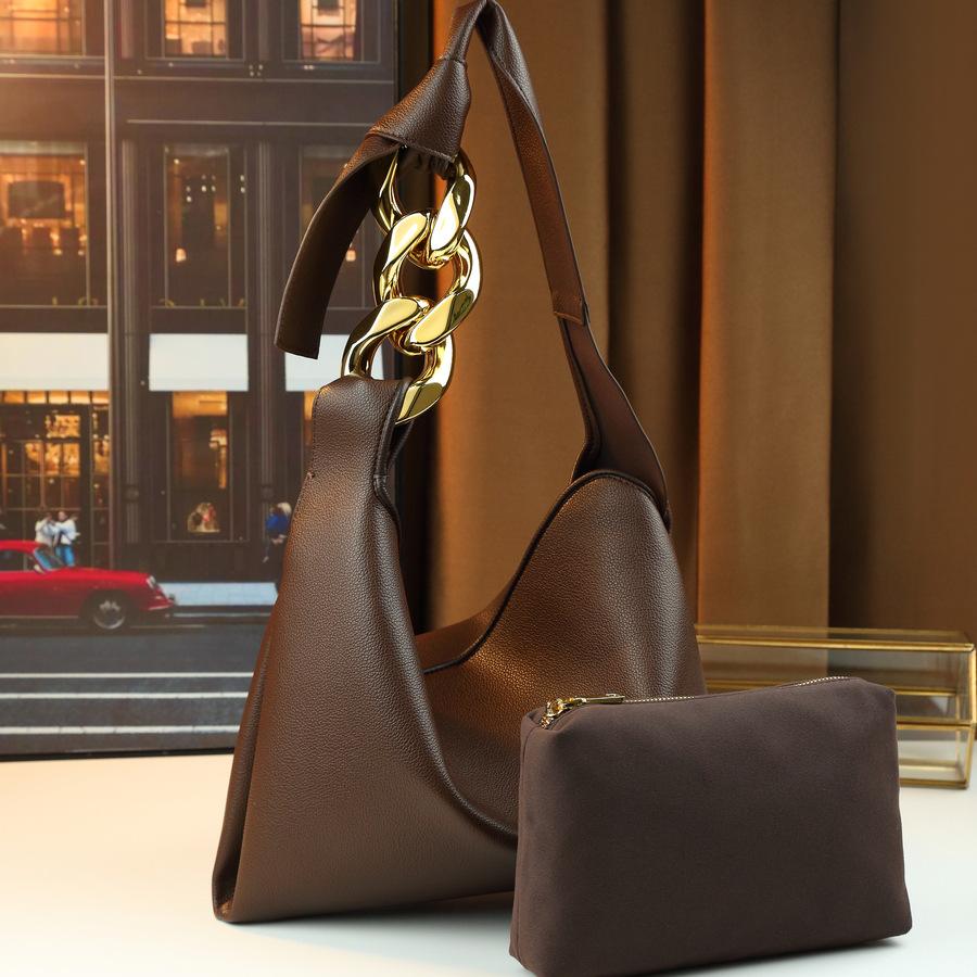 Spring Personalized Large Iron Chain Arm Women S Bag Retro Soft Leather Tote Bag Women S Simple Work Single Shoulder Child And Mother Bag темно-коричневого кольору
Spring Personalized Large Iron Chain Arm Women S Bag Retro Soft Leather Tote Bag Women S Simple Work Single Shoulder Child And Mother Bag темно-коричневого кольору