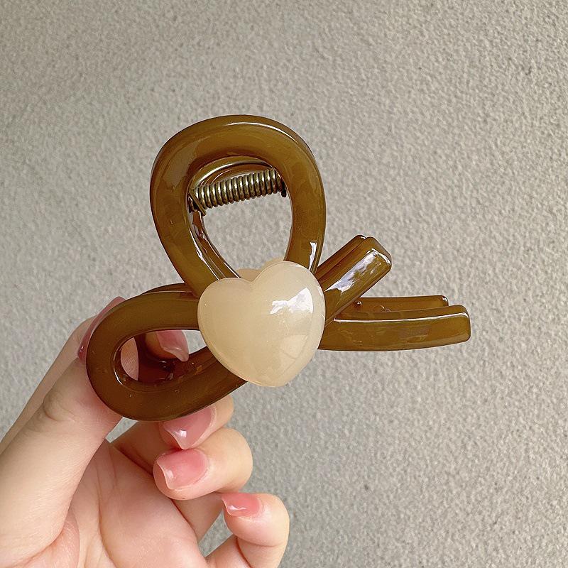 Korean Heart Bow Acrylic Claw Clip - Elegant Medium Hair Shark Clip for Updo
Korean Heart Bow Acrylic Claw Clip - Elegant Medium Hair Shark Clip for Updo