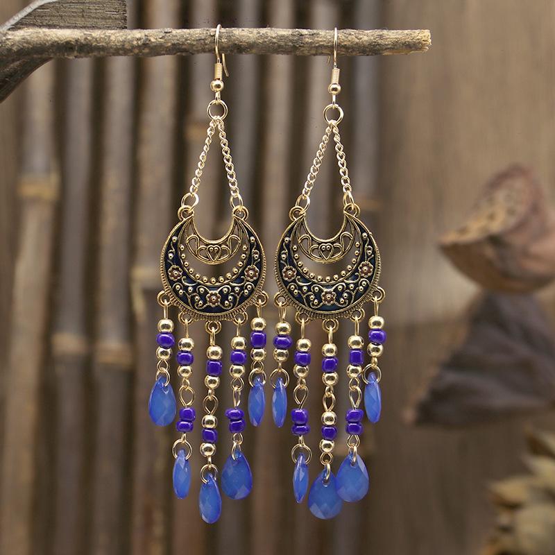 Ретро этнический стиль полумесяц длинные серьги женские богемные серьги капающие масло путешествия фотография Юньнань модифицированное лицо сапфировый
Ретро этнический стиль полумесяц длинные серьги женские богемные серьги капающие масло путешествия фотография Юньнань модифицированное лицо сапфировый