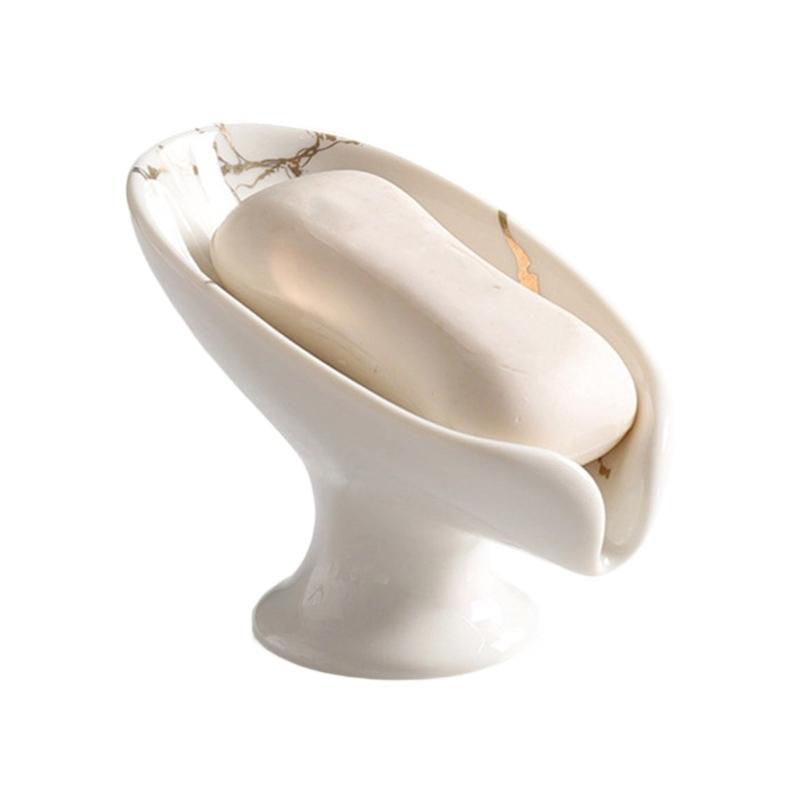 Керамическая мыльница с мраморным рисунком и автоматической дренажной системой предотвращает размокание мыла. Незаменимый аксессуар для дома и ванной. белый
Керамическая мыльница с мраморным рисунком и автоматической дренажной системой предотвращает размокание мыла. Незаменимый аксессуар для дома и ванной. белый