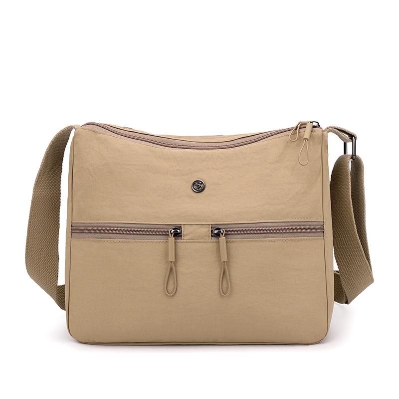 Женская нейлоновая сумка сумка через плечо однотонная сумка на плечо хаки
Женская нейлоновая сумка сумка через плечо однотонная сумка на плечо хаки