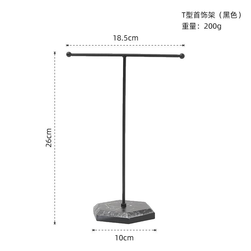 Newly designed metal gold T-shaped jewelry display stand for earrings, rings, necklaces, watches and pendants
Newly designed metal gold T-shaped jewelry display stand for earrings, rings, necklaces, watches and pendants