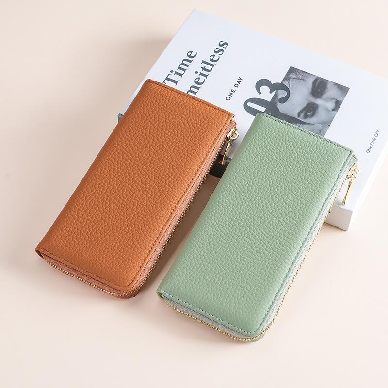 Leather RFID anti-magnetic anti-theft brush wallet female long seven-character zipper fashionable hand wallet can put mobile phone change помаранчевий
Leather RFID anti-magnetic anti-theft brush wallet female long seven-character zipper fashionable hand wallet can put mobile phone change помаранчевий