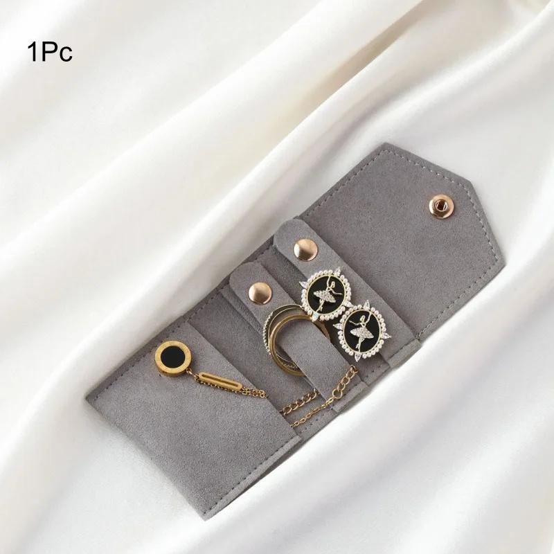 Mini Suede Button Jewelry Storage Bag, Specially Designed for Small Accessories Such As Earrings, Rings, Necklaces, Etc 6x5cm сірий
Mini Suede Button Jewelry Storage Bag, Specially Designed for Small Accessories Such As Earrings, Rings, Necklaces, Etc 6x5cm сірий
