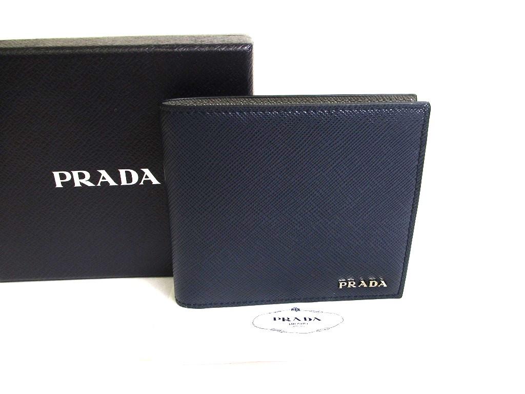 Автентичний шкіряний гаманець PRADA Saffiano Navy Blue Grey Compact Wallet #a586 Refurbished
Автентичний шкіряний гаманець PRADA Saffiano Navy Blue Grey Compact Wallet #a586 Refurbished