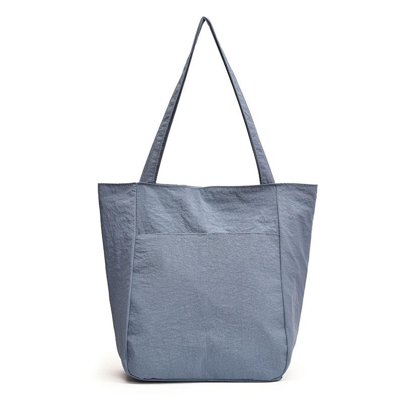 2024 large-capacity commuter tote bag Oxford cloth waterproof leisure bag New simple texture shoulder armpit bag синій
2024 large-capacity commuter tote bag Oxford cloth waterproof leisure bag New simple texture shoulder armpit bag синій
