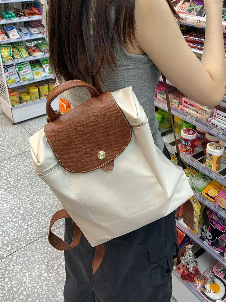 Жіночий рюкзак з нейлонової парусини, нова повсякденна сумочка для студентів, великої місткості, модний
Жіночий рюкзак з нейлонової парусини, нова повсякденна сумочка для студентів, великої місткості, модний