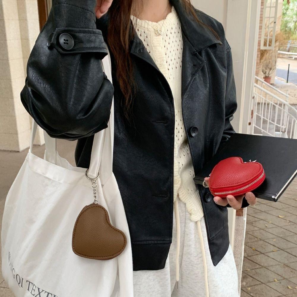 Heart-shaped Small Coin Purse PU Leather Bag Pendant Cute Storage Pouch світло-коричневого кольору
Heart-shaped Small Coin Purse PU Leather Bag Pendant Cute Storage Pouch світло-коричневого кольору