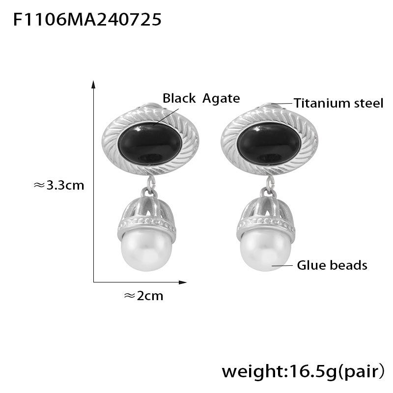 Винтажные геометрические серьги-кисточки из черного агата и искусственного жемчуга, из титановой стали с покрытием из 18-каратного золота.
Винтажные геометрические серьги-кисточки из черного агата и искусственного жемчуга, из титановой стали с покрытием из 18-каратного золота.