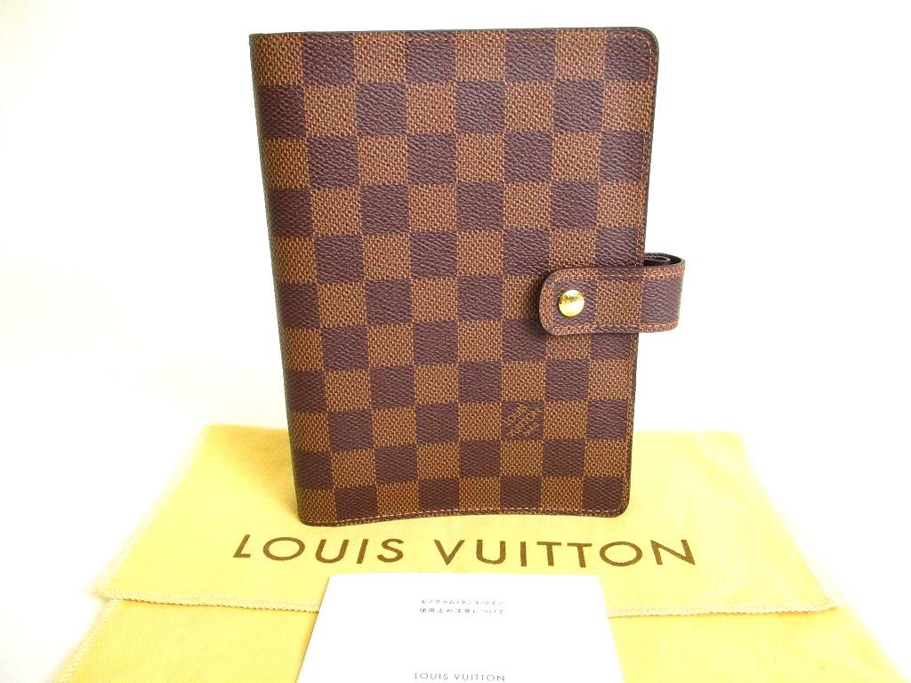 Автентичні шкіряні тримачі для документів LOUIS VUITTON Damier, середнє кільце, обкладинка Agenda #a044, відремонтована
Автентичні шкіряні тримачі для документів LOUIS VUITTON Damier, середнє кільце, обкладинка Agenda #a044, відремонтована