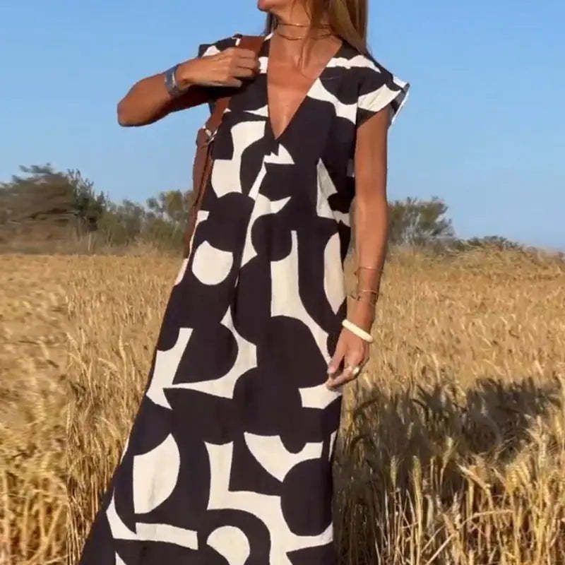 Black and White Abstract Print V-Neck Sleeveless Maxi Dress for Women, Casual Summer Dress with Side Slit S чорний
Black and White Abstract Print V-Neck Sleeveless Maxi Dress for Women, Casual Summer Dress with Side Slit S чорний
