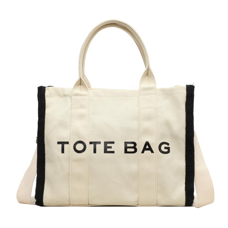 Большая вместительная стильная и простая портативная сумка-тоут 2024 года, модная сумка-мессенджер из холста, женская контрастная сумка через плечо бежевый
Большая вместительная стильная и простая портативная сумка-тоут 2024 года, модная сумка-мессенджер из холста, женская контрастная сумка через плечо бежевый