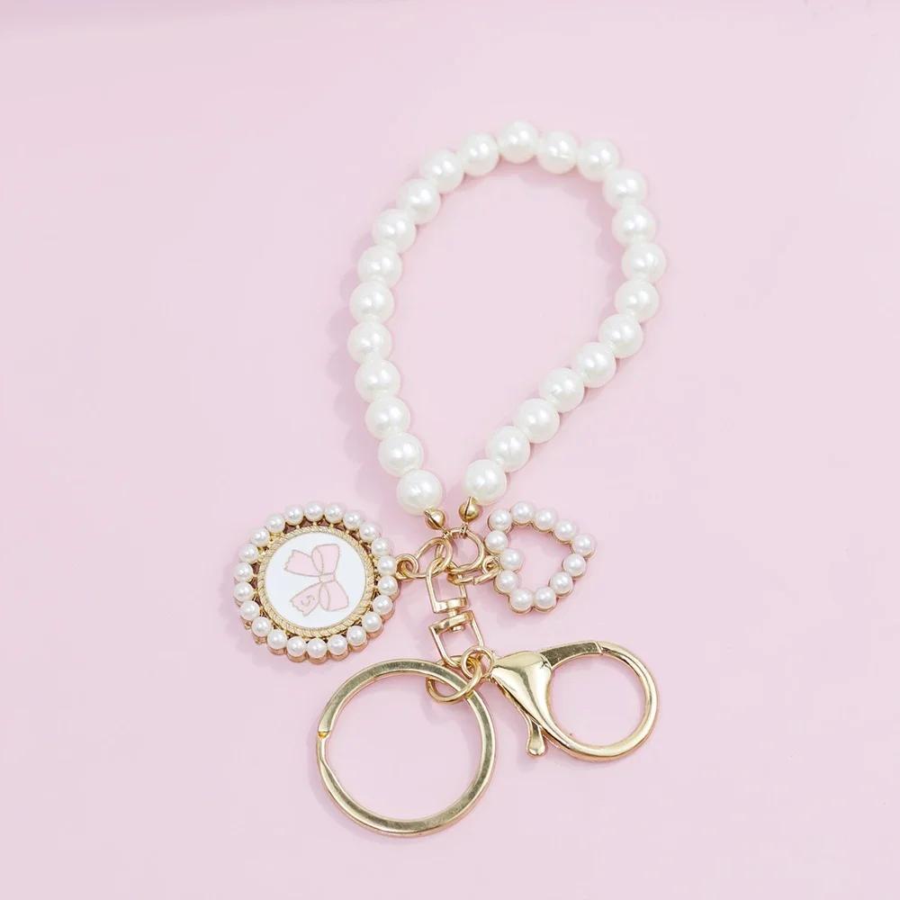 Модный брелок в виде розы из смолы, акриловый жемчужный бисерный брелок для мобильного телефона, брелок для рюкзака, аксессуар для автомобильного ключа
Модный брелок в виде розы из смолы, акриловый жемчужный бисерный брелок для мобильного телефона, брелок для рюкзака, аксессуар для автомобильного ключа