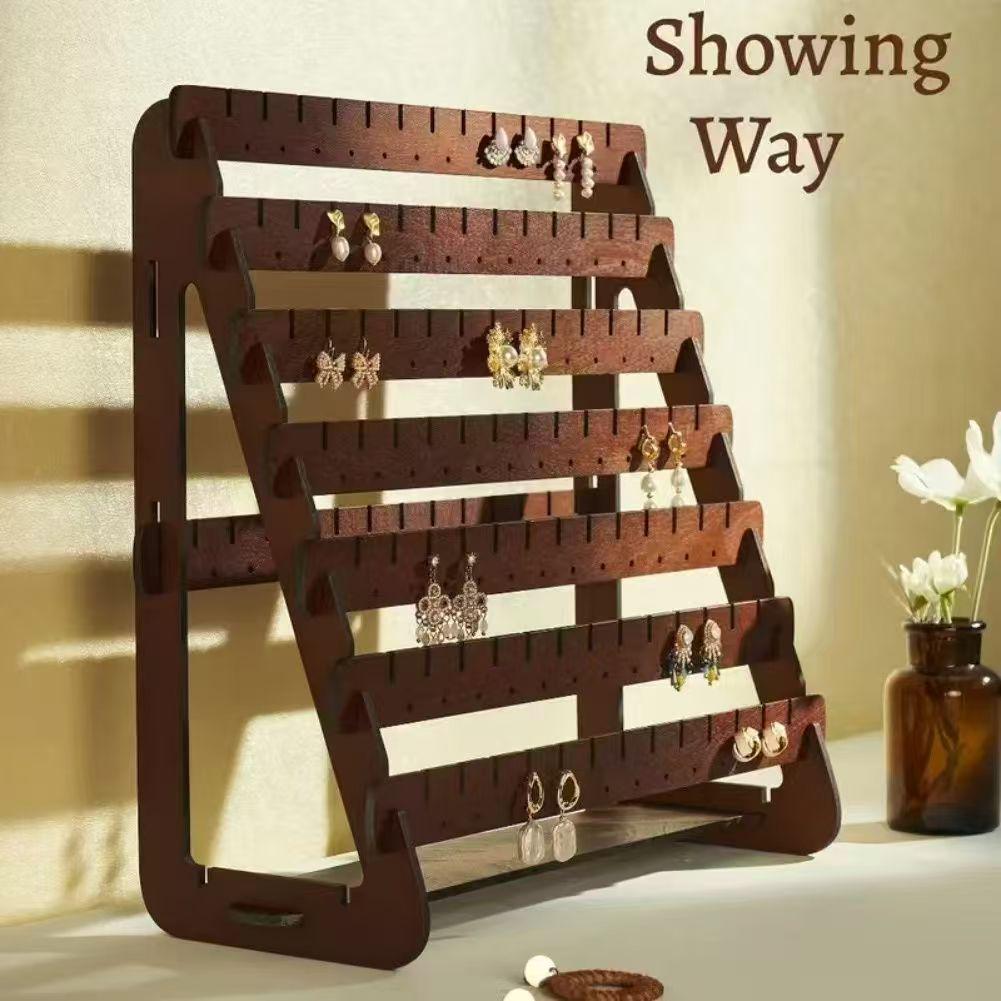 Деревянная многоярусная подставка для серег с крючками Seven-tier Earring and Necklace Display Rack
Деревянная многоярусная подставка для серег с крючками Seven-tier Earring and Necklace Display Rack