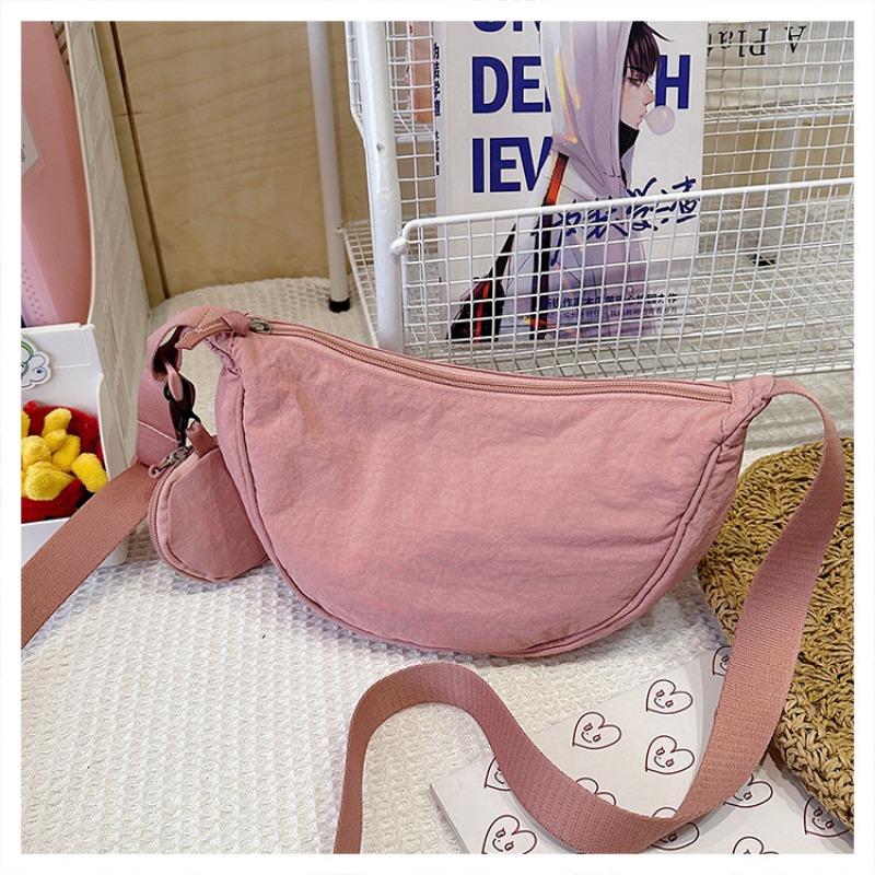 Сумка-пельмень женская новая весенняя однотонная сумка для мобильного телефона нишевая спортивная простая универсальная для отдыха и путешествий сумка-мессенджер розовый
Сумка-пельмень женская новая весенняя однотонная сумка для мобильного телефона нишевая спортивная простая универсальная для отдыха и путешествий сумка-мессенджер розовый