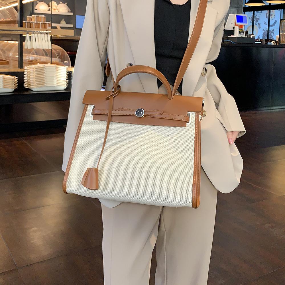 Premium bag 2025 new canvas Kelly bag handbag large capacity shoulder messenger bag commuter bag women
Premium bag 2025 new canvas Kelly bag handbag large capacity shoulder messenger bag commuter bag women