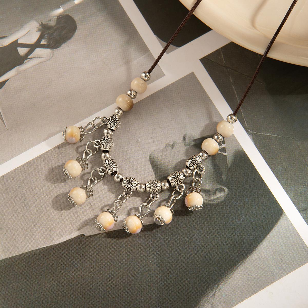 New Chinese Style Small Fresh Long Sweater Chain Round Bead Fringed Necklace Retro Ethnic Style Light Luxury Fashion Temperament Necklace
New Chinese Style Small Fresh Long Sweater Chain Round Bead Fringed Necklace Retro Ethnic Style Light Luxury Fashion Temperament Necklace