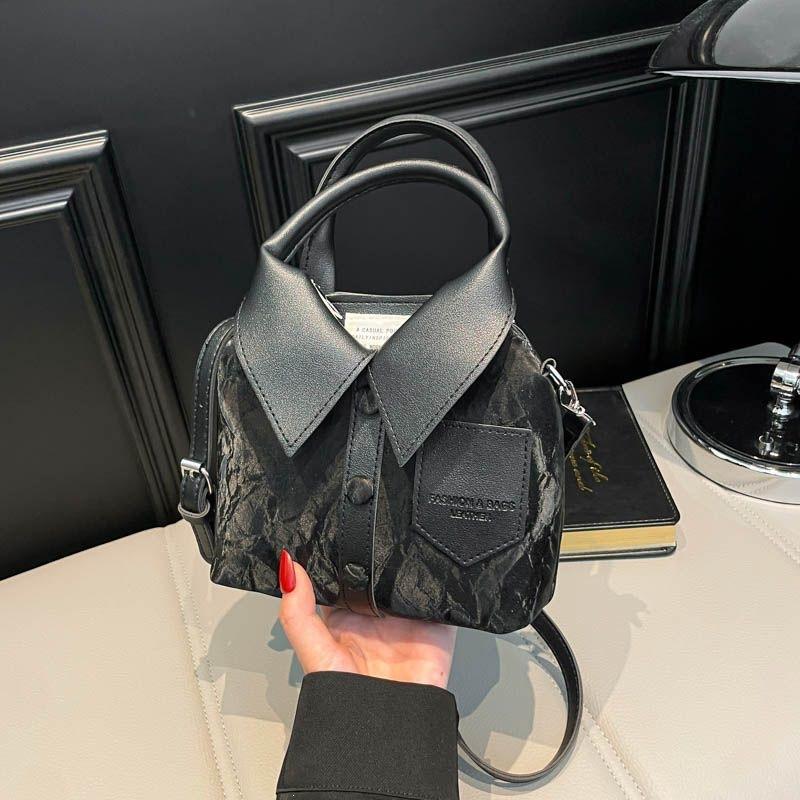 Niche design casual bag women s new fashion personality simple shoulder messenger bag portable versatile black E чёрный
Niche design casual bag women s new fashion personality simple shoulder messenger bag portable versatile black E чёрный