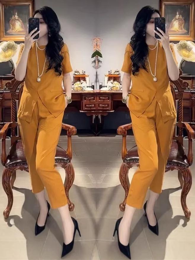 Plus Size Women s Round Neck Short Sleeve Set - Light Luxury Top & Nine-Point Pants XL чорний
Plus Size Women s Round Neck Short Sleeve Set - Light Luxury Top & Nine-Point Pants XL чорний