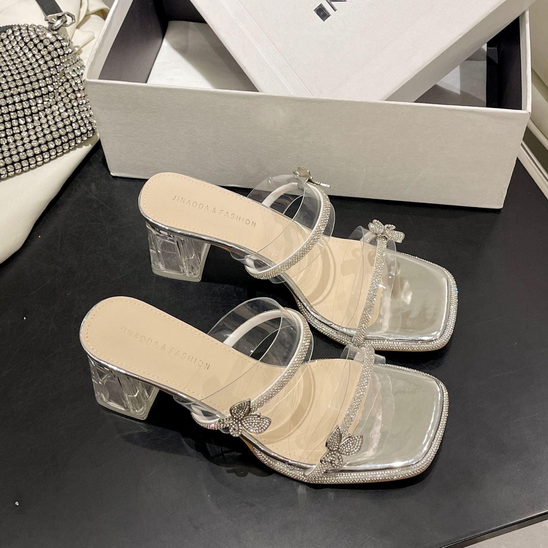 High-heeled slippers women s summer outer wear 2025 new transparent rhinestone one-word crystal thick-heeled cool slippers 35
High-heeled slippers women s summer outer wear 2025 new transparent rhinestone one-word crystal thick-heeled cool slippers 35