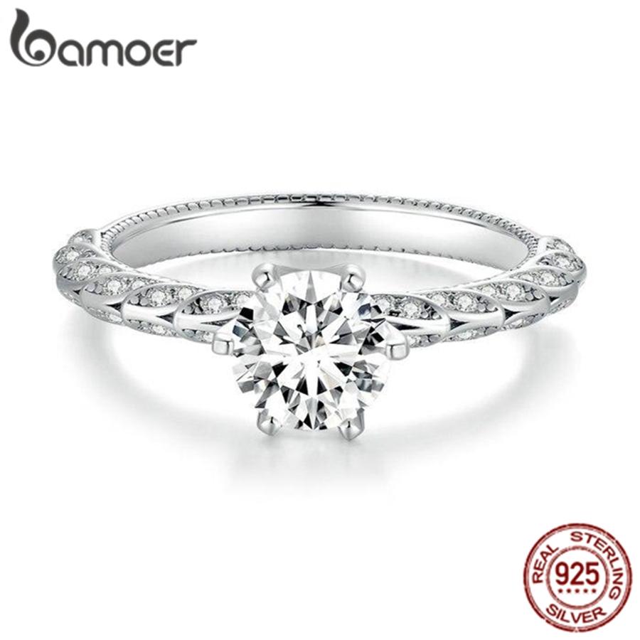 BAMOER 1.0CT D Цвет VVS1 EX Блестящий Муассанит Кольцо для Женщин Обручальное Свадебный Подарок Паве Кольцо Стерлингового Серебра 925 пробы CZ
BAMOER 1.0CT D Цвет VVS1 EX Блестящий Муассанит Кольцо для Женщин Обручальное Свадебный Подарок Паве Кольцо Стерлингового Серебра 925 пробы CZ