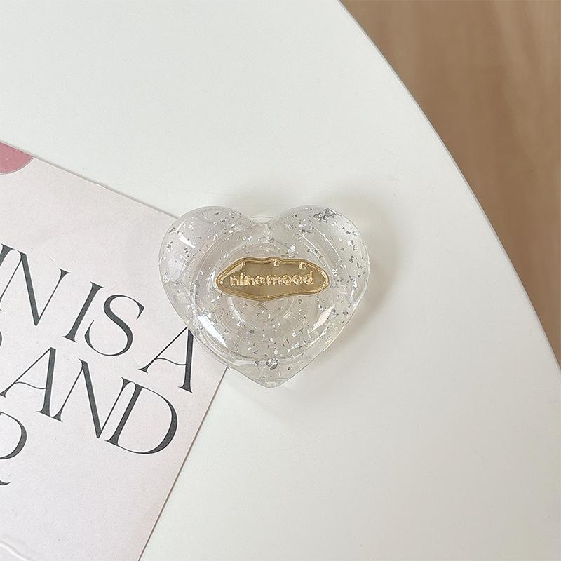 Solid Color Transparent Sequined Love Mobile Phone Airbag Bracket Pasted Retractable Lazy Desktop Watching Drama Support Ring Buckle
Solid Color Transparent Sequined Love Mobile Phone Airbag Bracket Pasted Retractable Lazy Desktop Watching Drama Support Ring Buckle