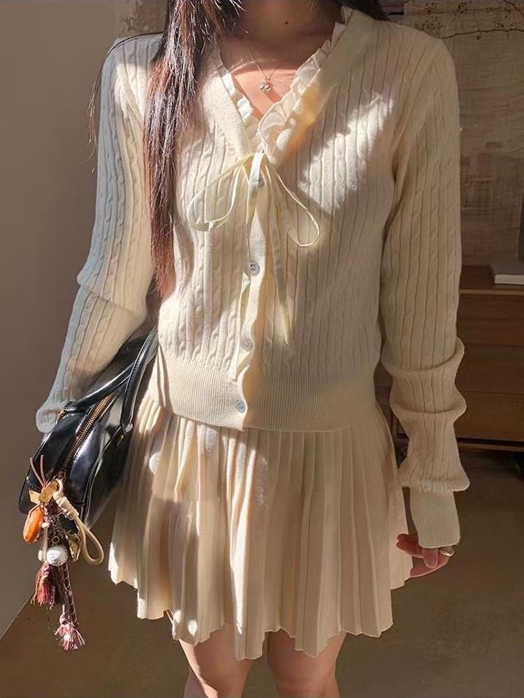 Корейский преппи вязаный кардиган с оборками и плиссированная миди-юбка для женщин (Осень зима) One Size
Корейский преппи вязаный кардиган с оборками и плиссированная миди-юбка для женщин (Осень зима) One Size