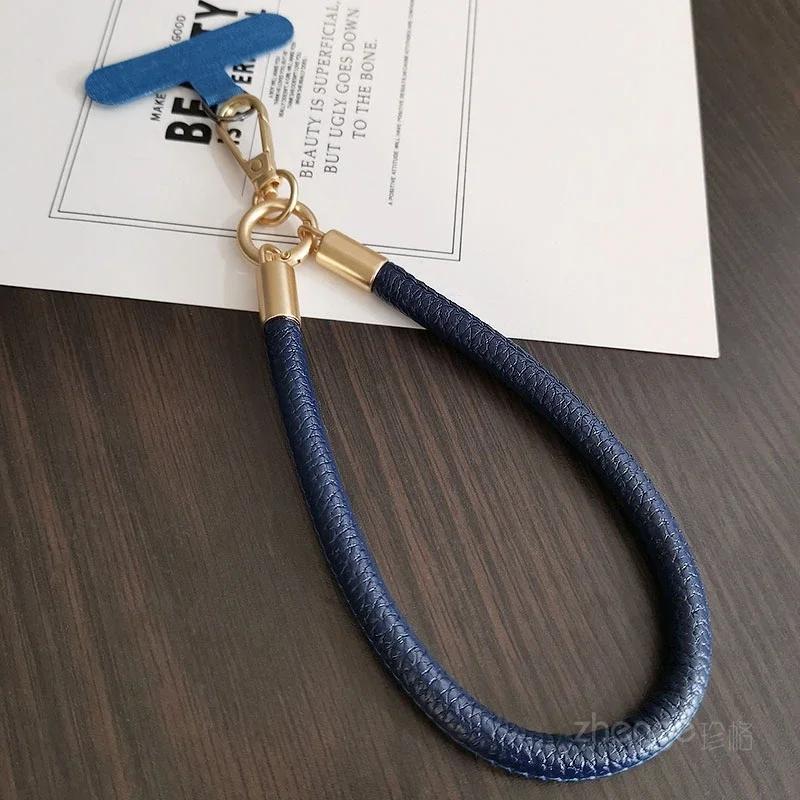 Leather Wrist Rope Detachable Buckle Clip Mobile Phone Case Universal Anti-drop Anti-drop Mobile Phone Rope
Leather Wrist Rope Detachable Buckle Clip Mobile Phone Case Universal Anti-drop Anti-drop Mobile Phone Rope