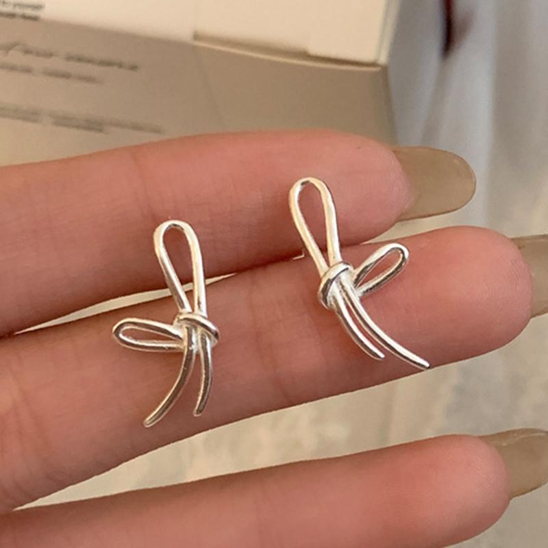 PANJBJ 925 Sterling Silver Bow Knot Earring for Women Texture Tassels Sweet Romantic Korean Jewelry Gift Dropshipping
PANJBJ 925 Sterling Silver Bow Knot Earring for Women Texture Tassels Sweet Romantic Korean Jewelry Gift Dropshipping