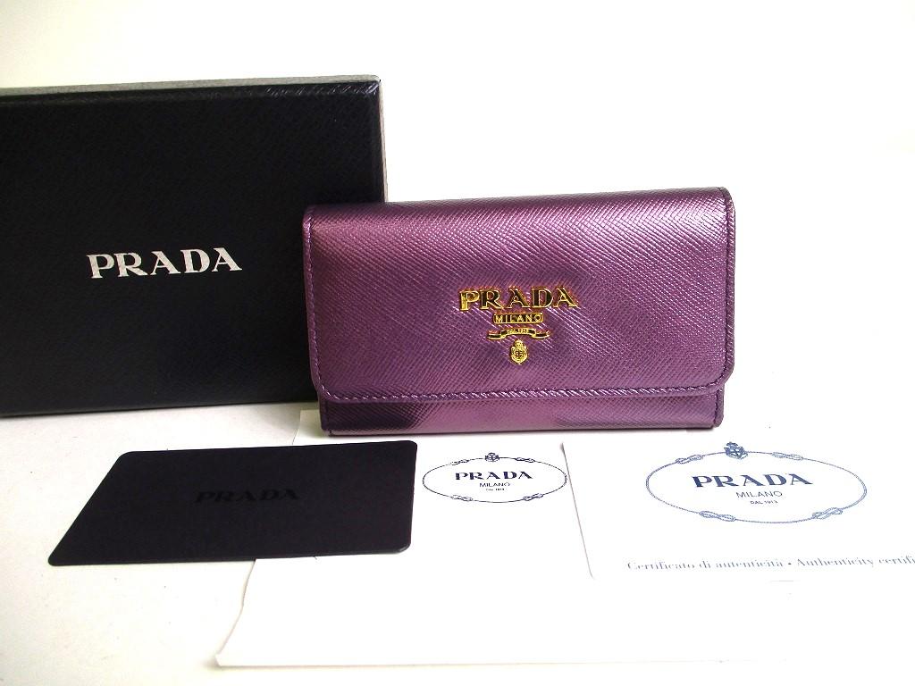 Автентичний брелок PRADA з металевою фіолетовою шкірою Saffiano 6 фото #a367 відремонтований
Автентичний брелок PRADA з металевою фіолетовою шкірою Saffiano 6 фото #a367 відремонтований