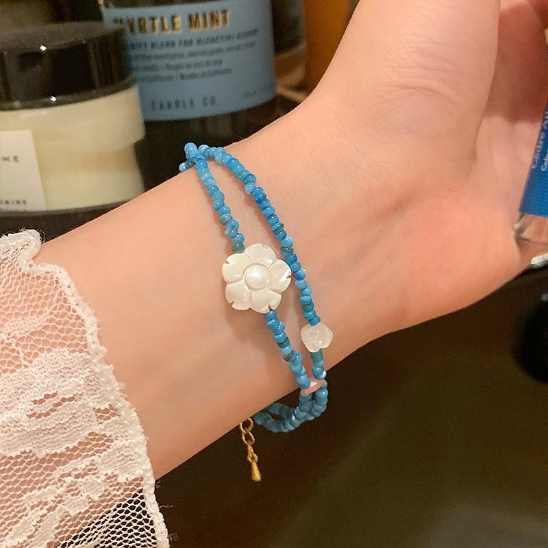 Double-layer rice beads, shell beads, flower bracelets, women s niche design temperament bracelets, fashionable simple and high-end jewelry women
Double-layer rice beads, shell beads, flower bracelets, women s niche design temperament bracelets, fashionable simple and high-end jewelry women