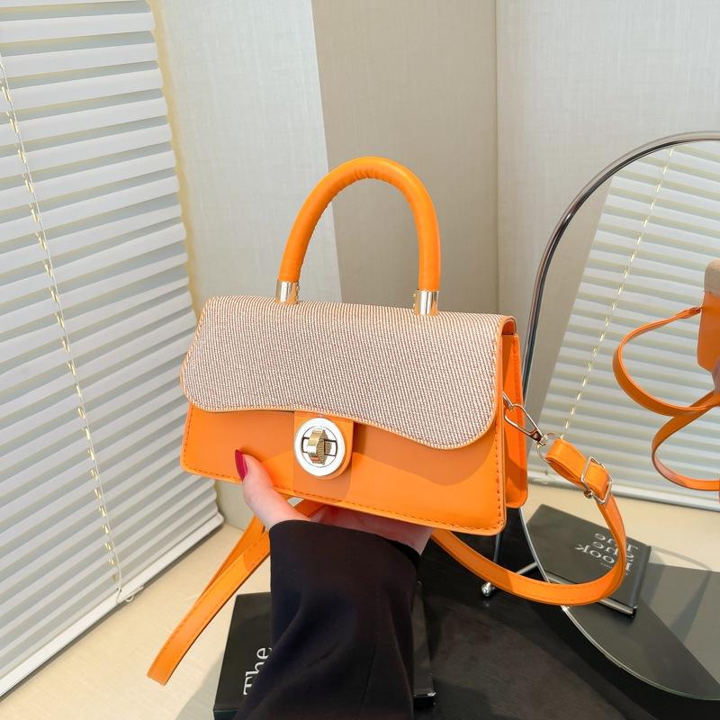 Temperament simple fashion lock contrasting color commuter lady crossbody portable shoulder small square bag помаранчевий
Temperament simple fashion lock contrasting color commuter lady crossbody portable shoulder small square bag помаранчевий