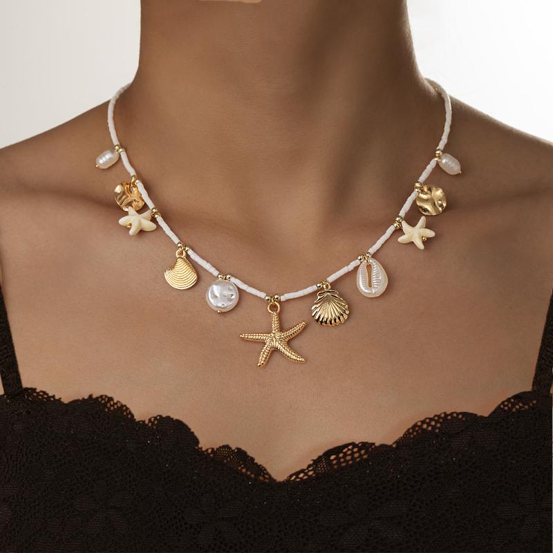 Богемное пляжное ожерелье из ракушек, ожерелье с подвеской из искусственного жемчуга, морской звезды и раковины конха, ювелирное изделие
Богемное пляжное ожерелье из ракушек, ожерелье с подвеской из искусственного жемчуга, морской звезды и раковины конха, ювелирное изделие
