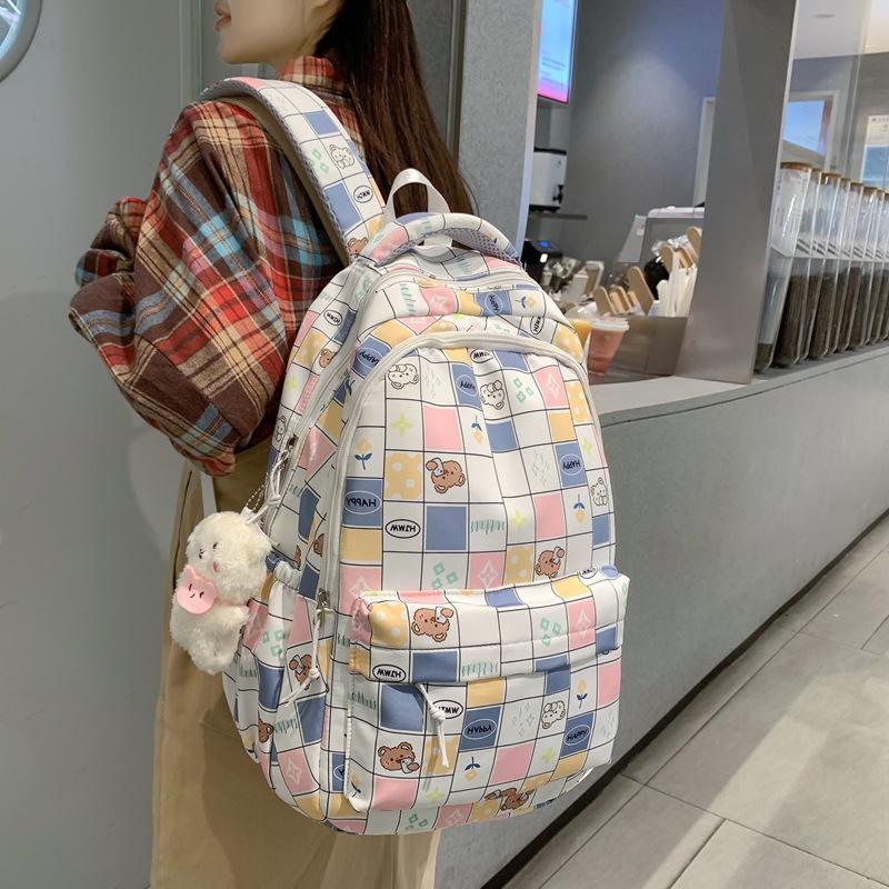 Школьная сумка Женский чек большой емкости Рюкзак студенческого кампуса
Школьная сумка Женский чек большой емкости Рюкзак студенческого кампуса