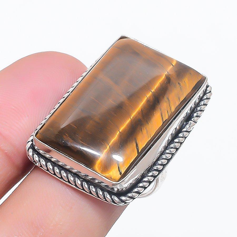 Ювелирное кольцо из серебра 925 пробы с драгоценным камнем тигровый глаз, размер 7
Ювелирное кольцо из серебра 925 пробы с драгоценным камнем тигровый глаз, размер 7