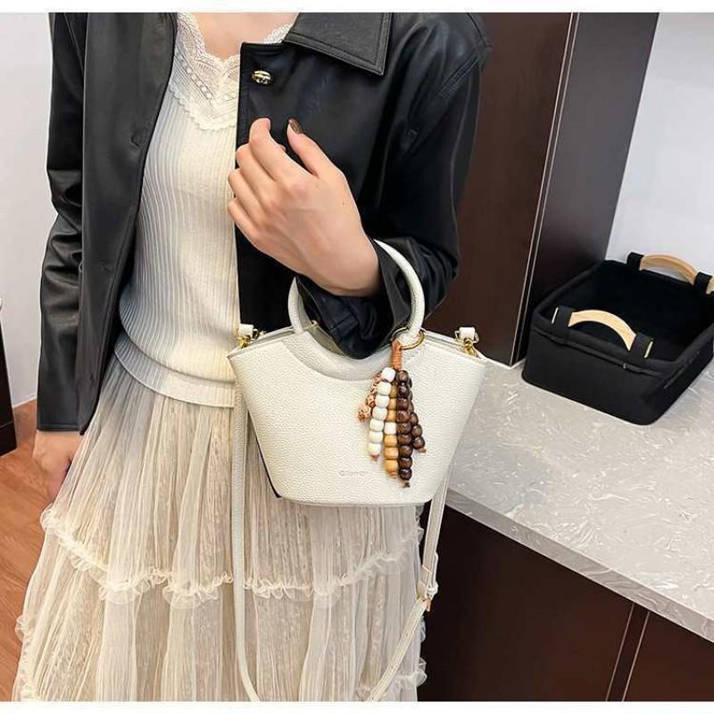 Retro High-end Niche Vegetable Basket Bag Fashionable All-matching One-shoulder Cross-body Portable Bucket 14x10x16 single package off білий колір
Retro High-end Niche Vegetable Basket Bag Fashionable All-matching One-shoulder Cross-body Portable Bucket 14x10x16 single package off білий колір
