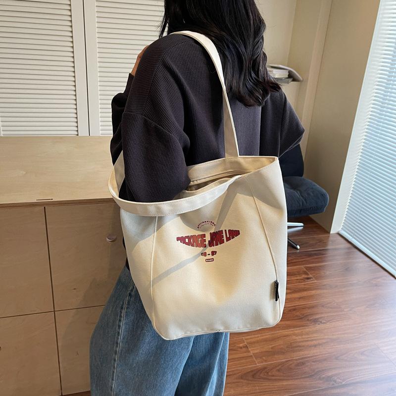 Canvas bag women s large capacity 2025 new summer versatile simple shoulder bag casual college student tote bag чорний
Canvas bag women s large capacity 2025 new summer versatile simple shoulder bag casual college student tote bag чорний