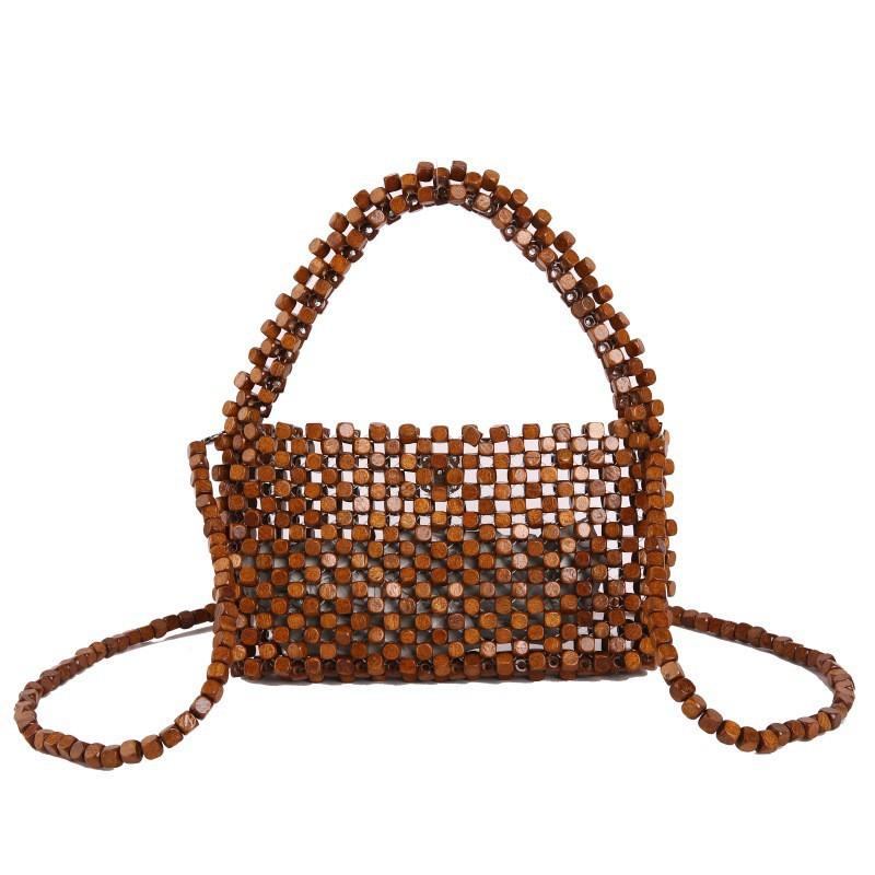 Fashion Beaded Handbag Female Niche Hollow Beach Bag Personalized Chain Shoulder Cross-body коричневий
Fashion Beaded Handbag Female Niche Hollow Beach Bag Personalized Chain Shoulder Cross-body коричневий