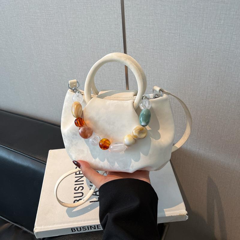 Niche design bag women s new summer versatile messenger bag casual pleated portable bucket bag белый
Niche design bag women s new summer versatile messenger bag casual pleated portable bucket bag белый