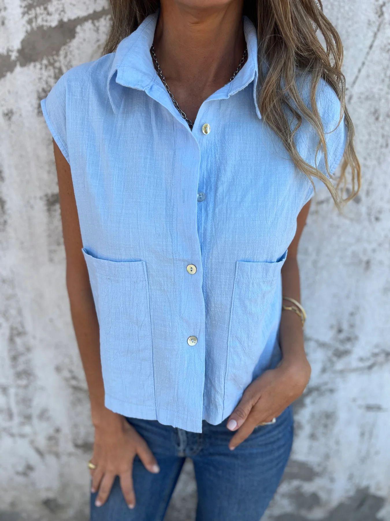 New European and American casual summer loose short-sleeved button-up pocket cotton and linen shirt for women 3XL світло-синій колір
New European and American casual summer loose short-sleeved button-up pocket cotton and linen shirt for women 3XL світло-синій колір