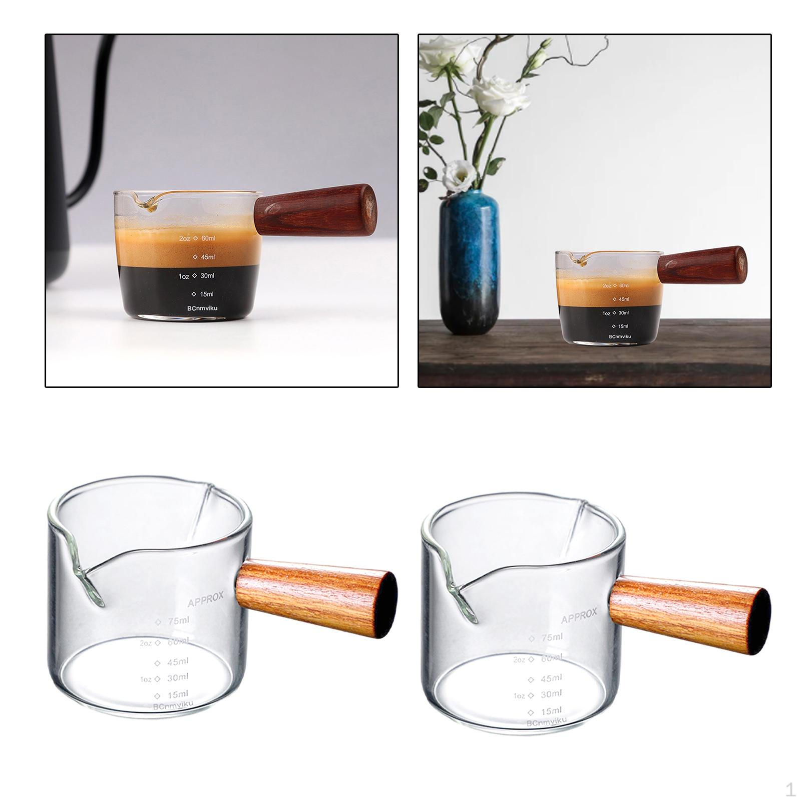 2x - термостойкий стеклянный мерный стакан с деревянной ручкой для напитков в кафе
2x - термостойкий стеклянный мерный стакан с деревянной ручкой для напитков в кафе