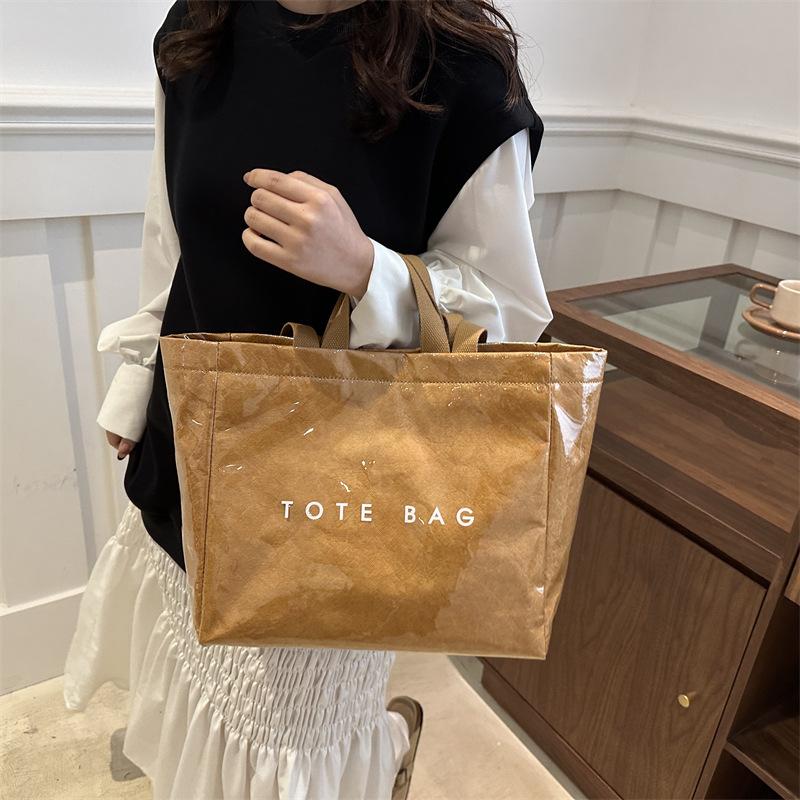 Large capacity DuPont paper jelly bag fashionable transparent water-proof tote bag work tote bag shoulder bag one size fits all чорний
Large capacity DuPont paper jelly bag fashionable transparent water-proof tote bag work tote bag shoulder bag one size fits all чорний