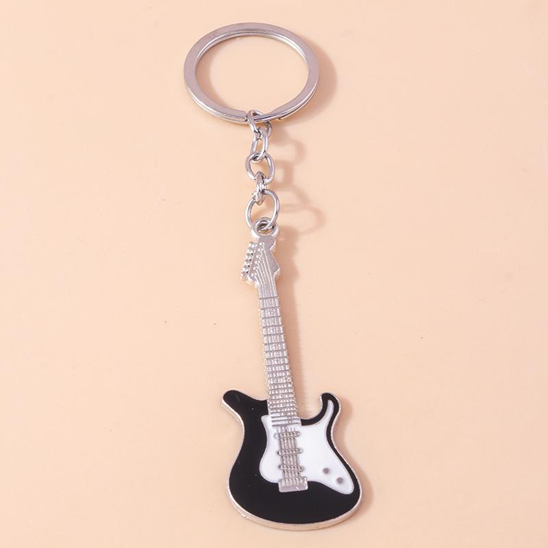 Creative Metal Guitar Key Chain Mini Musical Instruments Key Ring Pendants for Women Girls Handbag Charms DIY Jewelry Gift
Creative Metal Guitar Key Chain Mini Musical Instruments Key Ring Pendants for Women Girls Handbag Charms DIY Jewelry Gift