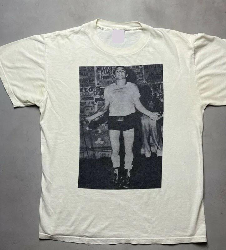 HOT Morrissey Oye Esteban 1999 Tour Dates Kenny Lane Boxer Tee Shirt Unisex T-Shirt XXL
HOT Morrissey Oye Esteban 1999 Tour Dates Kenny Lane Boxer Tee Shirt Unisex T-Shirt XXL